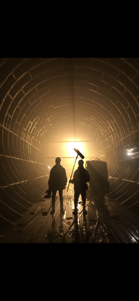 World's Busiest Cities - silhouette crew in tunnel